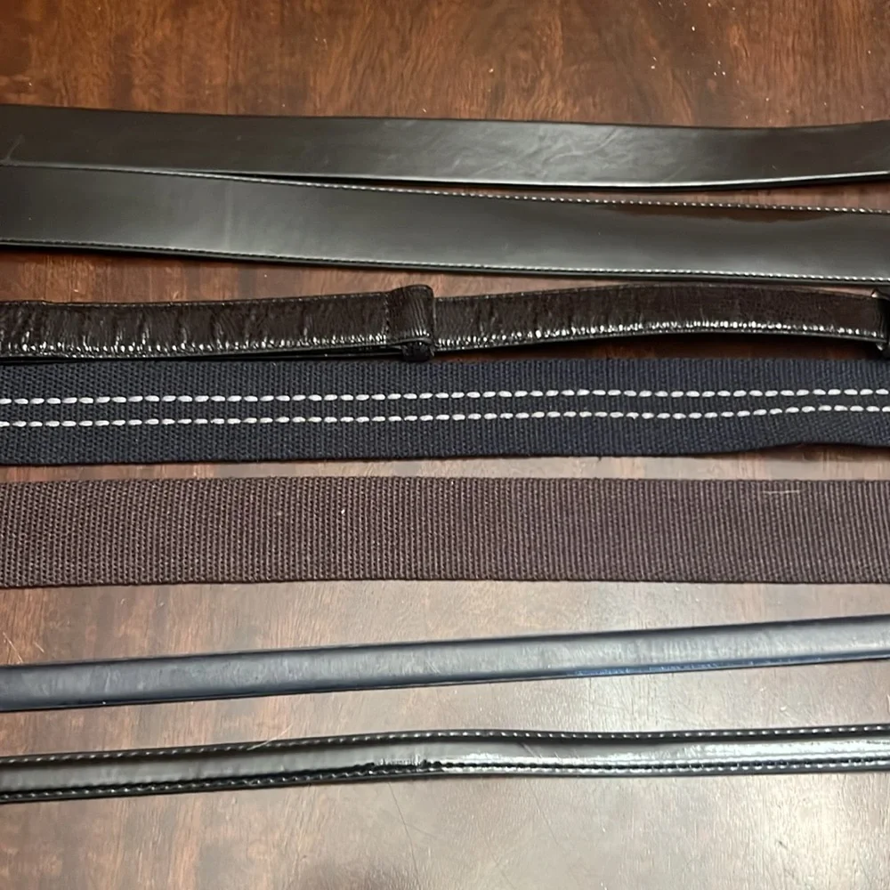Bundle of 5 Black Belts. Plus one blue one brown